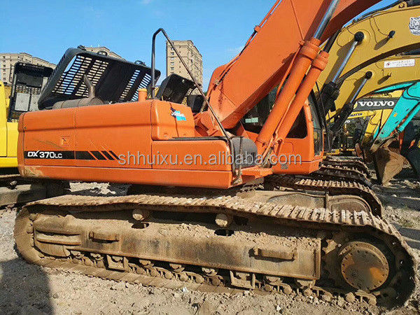 دوسان بيع ساخن جودة ممتازة اليد ثانية الحفرة الزحفية الهيدروليكية دوسان DX370 كوريا منشأ/آلة حفر مستعملة أفضل بيع سعر جيد